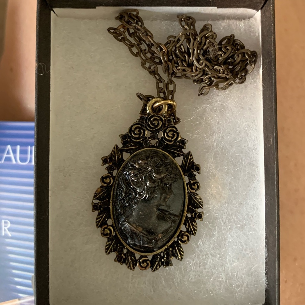 Vintage necklace pendant with woman portrait